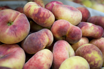 ripe juicy peach on the shop counter