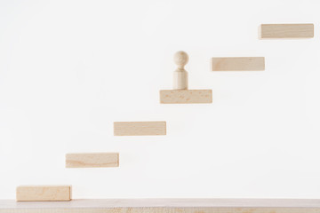 Career concept. Business metaphor. Concept of business learning success. Man climbs the stairs. Achieving success. Career, social status. Business competition.