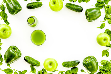 Fitness greeny drink with vegetables on white background top view mock-up