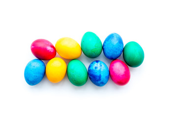easter celebration with colorful eggs on white background top view mock-up