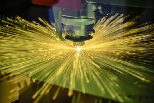 The fiber laser cutting machine cutting the metal plate.