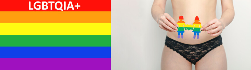 Woman in black lingerie with lgbt symbol, gay emblem