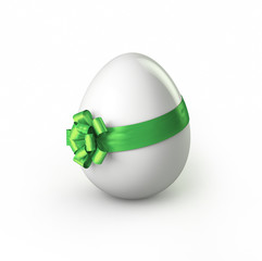 Easter egg with green ribbon
