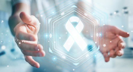 Businessman using digital ribbon cancer interface 3D rendering