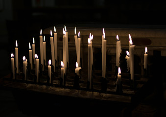 Candele in chiesa per preghiere- Candles  in a  Catholic Church