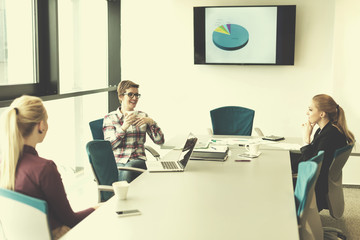 young business people group on meeting at modern office