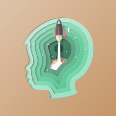Rocket startup concept and Head of child stack in paper art layer style.