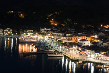 Fototapeta premium Panorama of the center of the town of Sivota in Greece at night