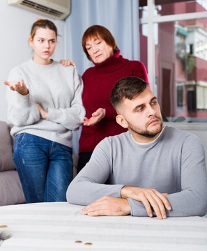 Chagrined guy having problems in relationship with family