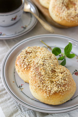 Traditional Romanian and Moldavian sweet buns in the form of eight with honey glaze and nut crumbs.