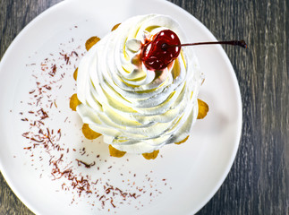 cake with cream and cherries