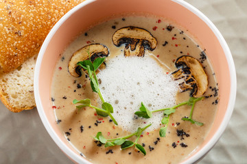 Mushroom cream soup and champignon in bowl