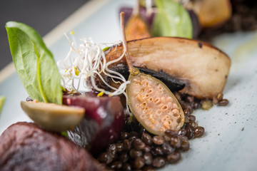 Portobello mushroom with spanish capers, vegan dish close up