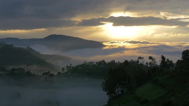 Landscape with hills covered with mist