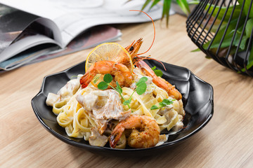 Pasta Tagliatelle with prawns and chanterelles mushrooms