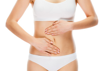 Woman massaging stomach pain on white background