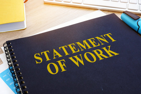 Statement of Work SOW on an office desk.