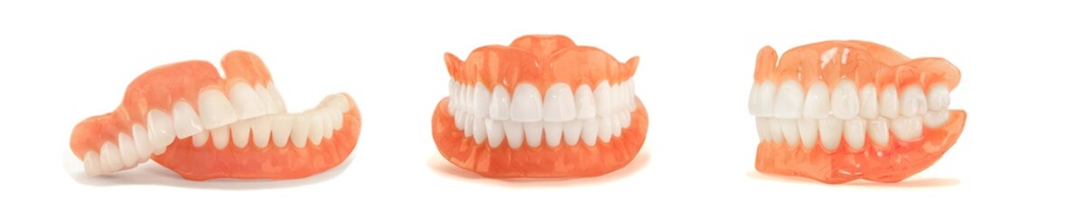 dentures. Isolate on white background acrylic prosthesis of human jaws. The concept of orthopedic dentistry