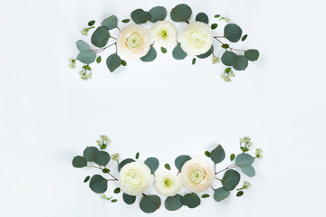 Pink roses on white background. Flat lay. Frame wreath