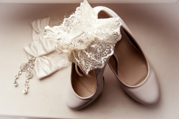 Fototapeta na wymiar white bridal shoes