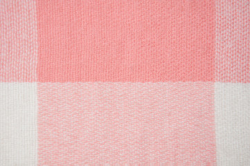 Fototapeta premium knitted fabric texture, warm light pink textile background