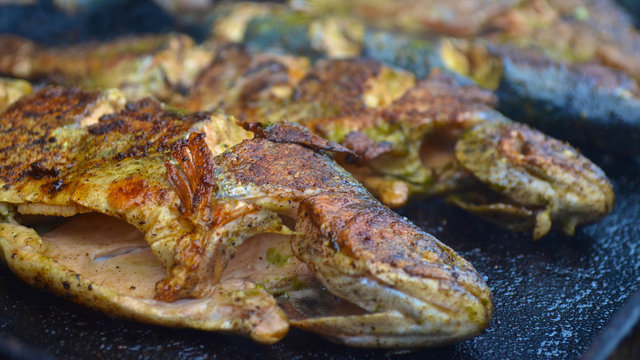 Fresh river trout on a grill in the Peruvian village of Ingenio, near Huancayo in the Peruvian Andes