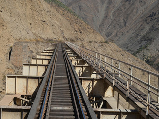 Fototapeta premium Puente Carrion, the longest bridge on the Ferrocarril Central train line between Lima and Huancayo, in the Peruvian Andes