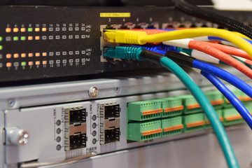 Network switch and ethernet cables - obrazy, fototapety, plakaty