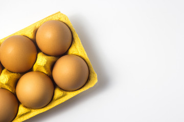 Eggs in a package on a white background