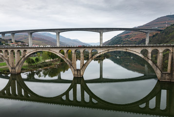 Two bridges in the town of Peso de Regua, in Portugal