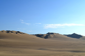 Fototapeta na wymiar Sand dunes in Huacachina desert, Ica, Peru