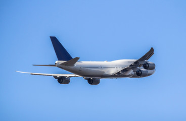 Fototapeta na wymiar Passanger airplane taking off