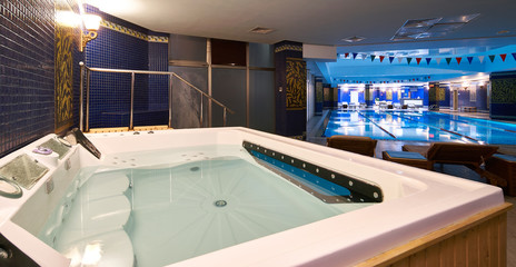 Obraz premium Interior of public swimming pool in a luxury fitness gym.