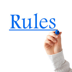 Rules text and writing hand