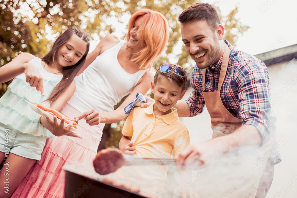 Canvas Prints family having a barbecue party