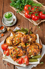 Chicken kebab with pita bread, tomatoes and pickled cucumbers