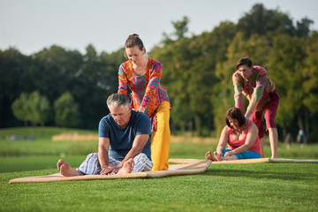 Thai massage, healing back. Thai yoga massage arm stretching technique.
