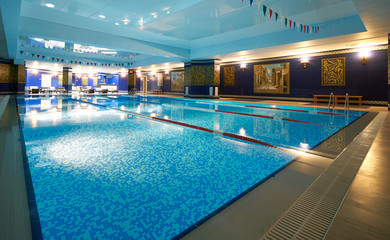 Fototapeta premium Interior of public swimming pool in a luxury fitness gym.