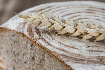 Homemade bread on rye leaven. Dietary bread with flax seeds. The concept of a healthy diet