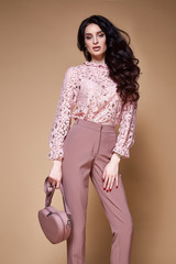 Beautiful sexy woman long brunette hair glamour model wear pants and lace blouse work office style...