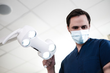 Man dentist working in private practice.