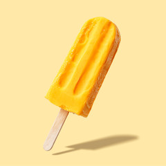 Fruit ice cream on a stick. Bright color, summer mood.