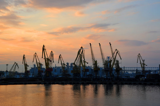 Port cargo crane at sunset