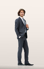 Full length of a fashion male model over white  background.