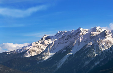 Fototapeta na wymiar Snowy mountain peaks
