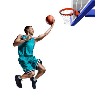 male basketball player jumping to the basket isolated on white