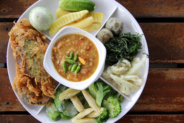 thai food, spicy paste sauce with fried egg with climbing wattle