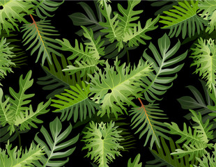 Seamless tropical pattern with palm leaves for fabric design or other uses.