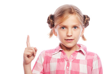 Blond girl pointing her finger up, isolated on white