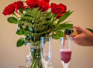 Pouring glass of sparkling cider